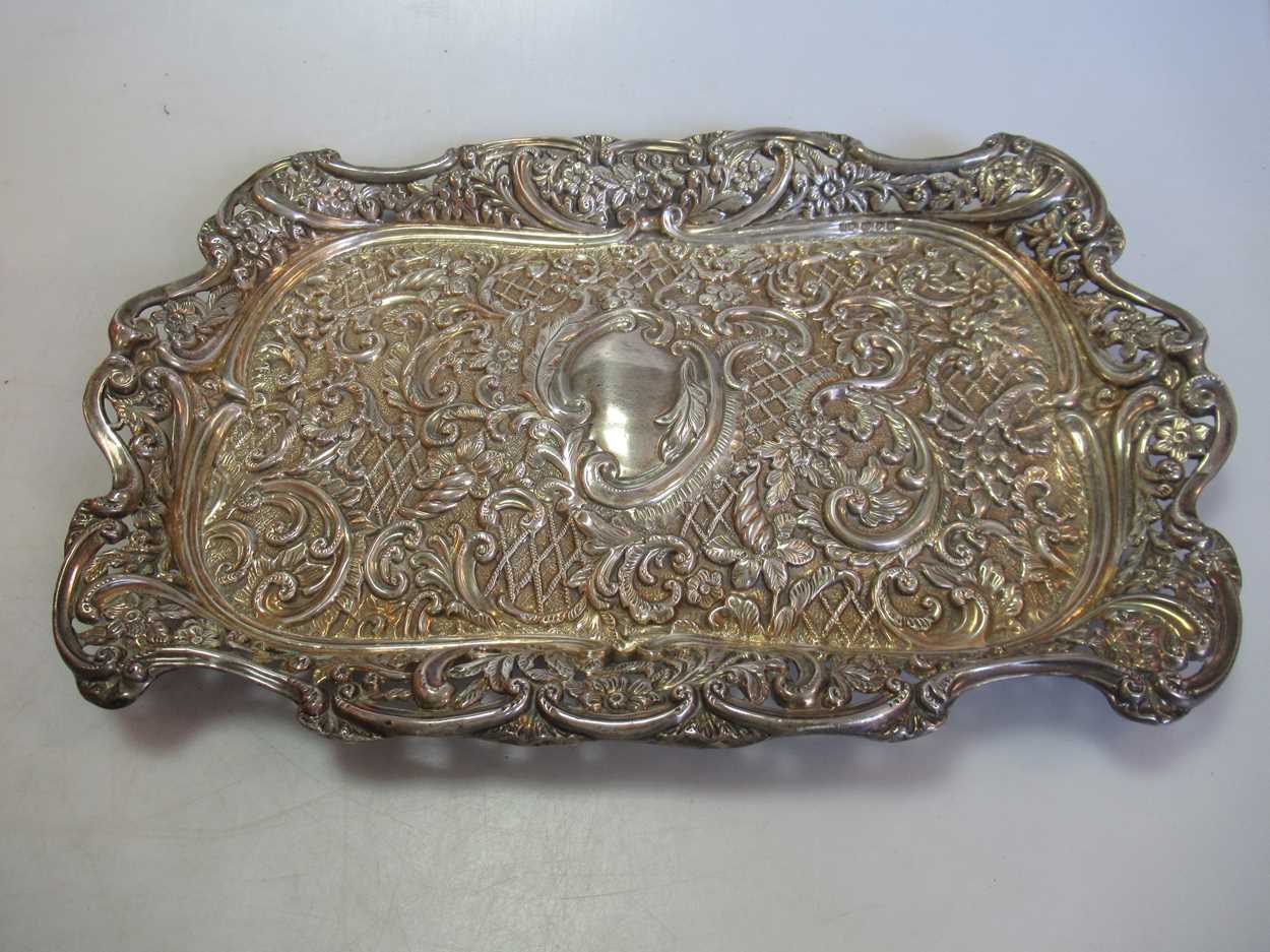 Lot 250 - A hallmarked silver dish by Henry Matthews,...