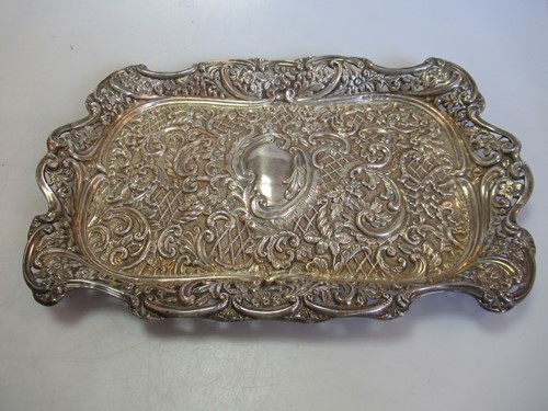 Lot 250 - A hallmarked silver dish by Henry Matthews,...