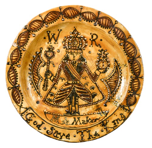 Lot 243 - A large slipware Thomas Toft style charger