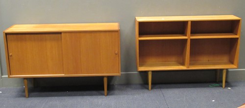 Lot 537 - A 20th century teak sideboard on tapered legs together with a teak open bookshelf on tapered legs