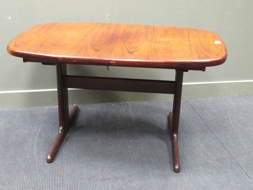 Lot 569 - A Danish type extending dining table