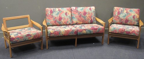 Lot 544 - A 20th century blonde oak three piece suite