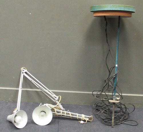 Lot 567 - A spiked garden light together with two angle poise lamps with clamp bases (3)