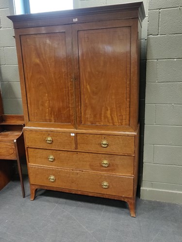 Lot 447 - A 19th century mahogany linen press (adapted)...