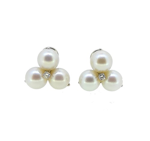 Lot 47 - A pair of cultured pearl and diamond ear clips