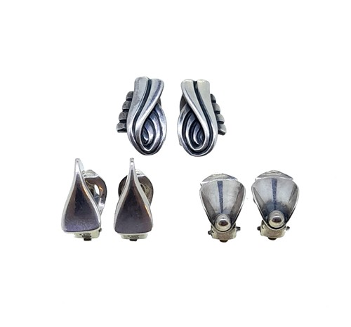 Lot 11 - Edvard Kindt-Larsen for Georg Jensen - A pair of ear clips, together with two pairs of ear clips