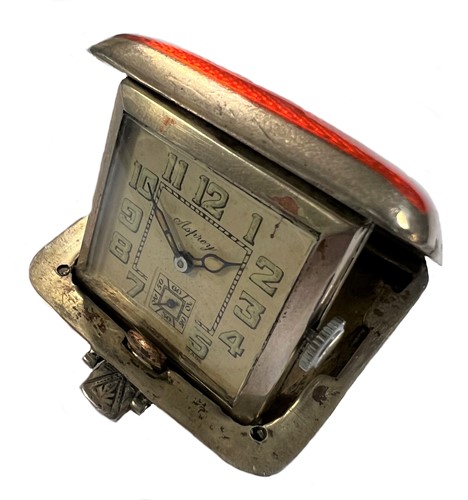 Lot 336 - Asprey - A Sterling silver and enamel captive desk watch