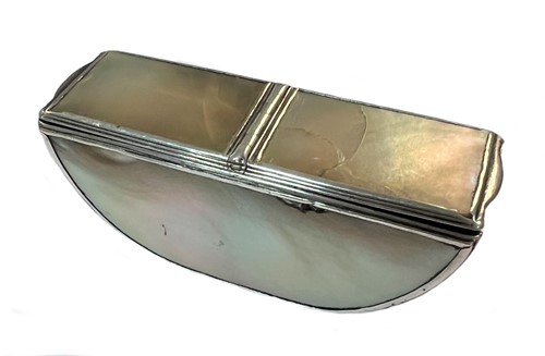 Lot 373 - A 19th century mother of pearl set double compartment snuff box