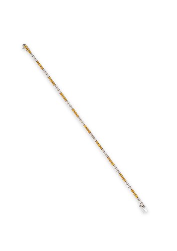 Lot 204 - A yellow sapphire and diamond line bracelet
