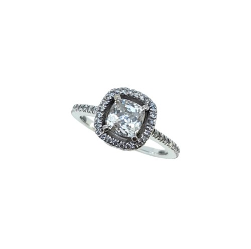 Lot 195 - An 18ct gold diamond set halo ring