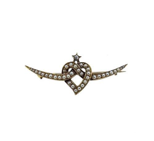 Lot 64 - A split pearl and diamond set heart brooch
