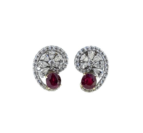 Lot 239 - A pair of Burmese ruby and diamond swirl ear studs