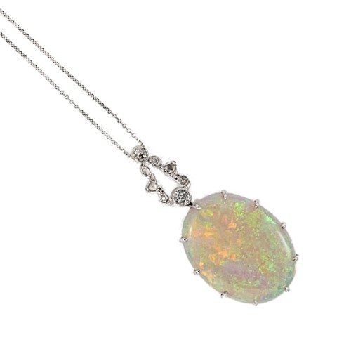 Lot 234 - An opal and diamond pendant and chain