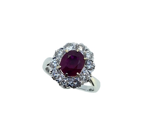 Lot 240 - A Burmese ruby and diamond cluster ring
