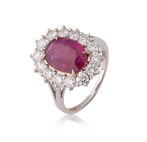 Lot 237 - A Burmese ruby and diamond cluster ring