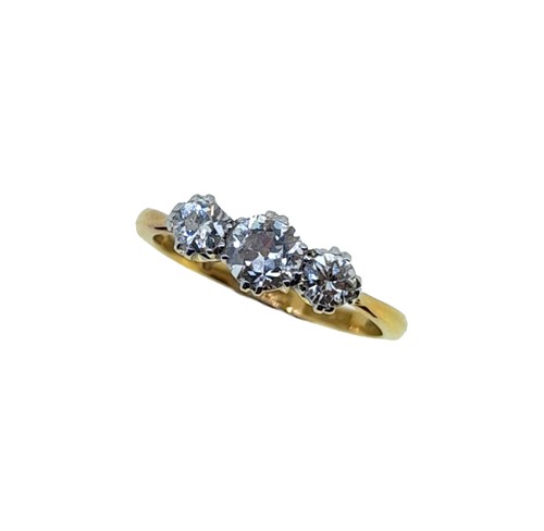 Lot 96 - An early 20th century three stone diamond ring