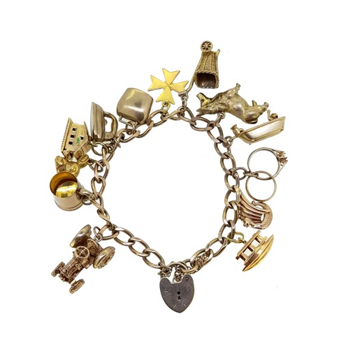 Lot 132 - A late 20th century charm bracelet