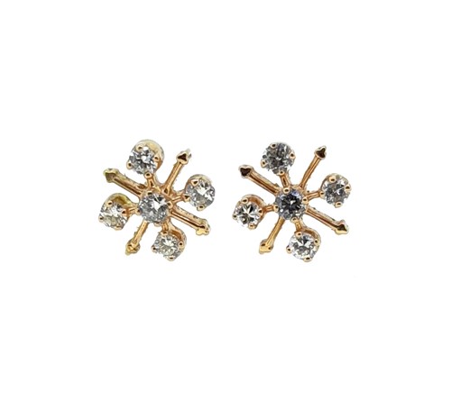 Lot 99 - A pair of snowflake style diamond set ear studs
