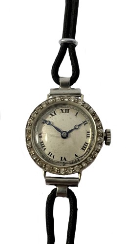 Lot 350 - Unsigned - An 18ct gold diamond set cocktail watch