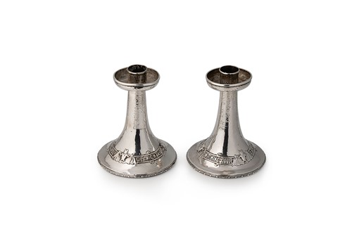 Lot 517 - A pair of George V silver candlesticks, mark of Albert Edward Jones