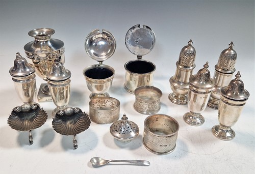 Lot 204 - A collection of silverware including napkin...