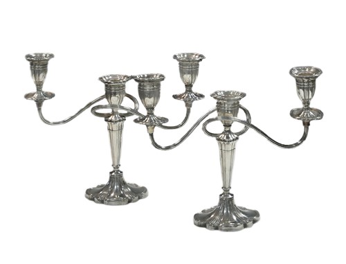 Lot 531 - Two mid 20th century silver three light candelabra