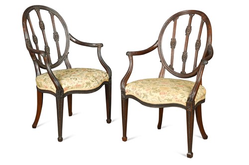 Lot 354 - A pair of 'Hepplewhite' mahogany elbow chairs, late 18th century