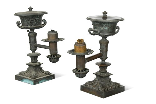 Lot 495 - A pair of William IV bronze colza lamps