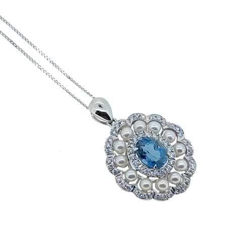 Lot 131 - An aquamarine, diamond and pearl pendant and chain