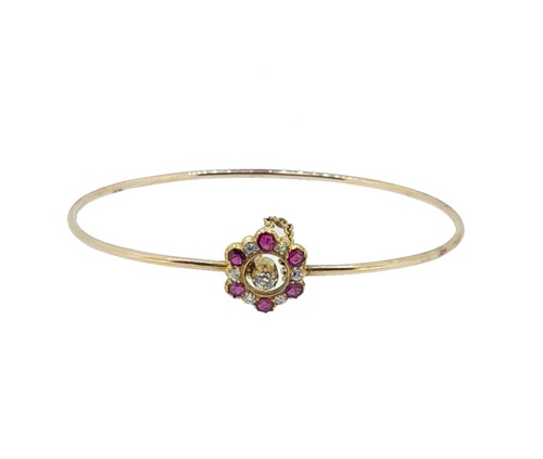 Lot 40 - A ruby and diamond bangle