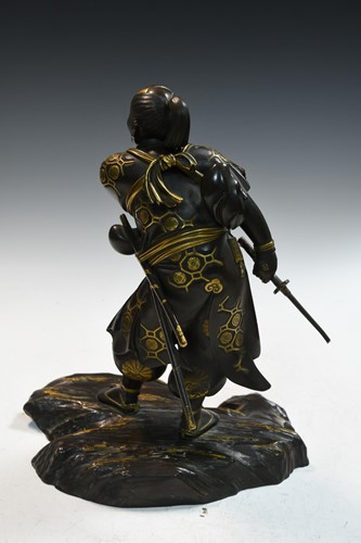 Lot 107 - A Japanese parcel-gilt bronze of a samurai, possibly by Miyao Eisuke