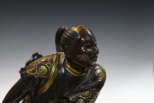 Lot 107 - A Japanese parcel-gilt bronze of a samurai, possibly by Miyao Eisuke