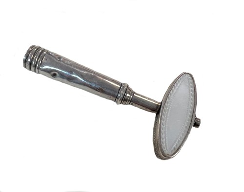Lot 427 - A George III travelling corkscrew, mark of Samuel Pemberton