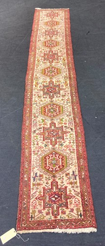 Lot 595 - A Heriz runner, 402 x 66cm