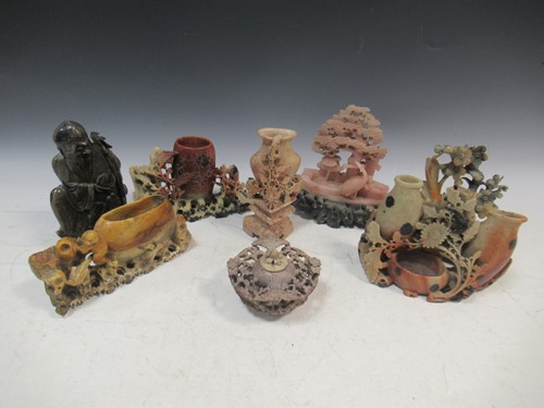 Lot 119 - A group of carved soapstone items to include...