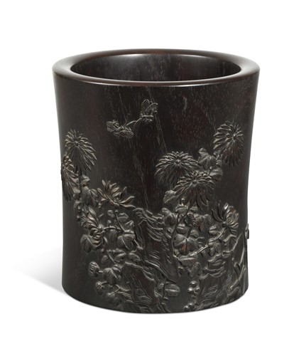 Lot 106 - A Chinese zitan-type wood flared cylindrical brush pot, 20th century