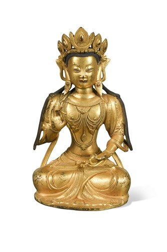 Lot 59 - A Chinese gilt bronze figure of Maitreya