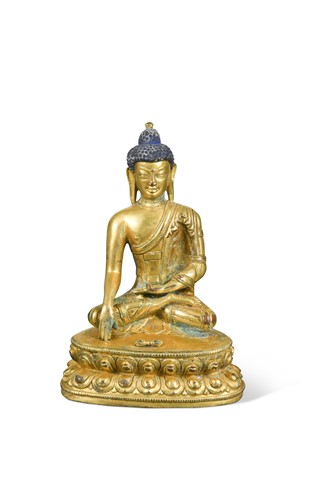 Lot 58 - A Chinese gilt bronze small figure of the seated Buddha