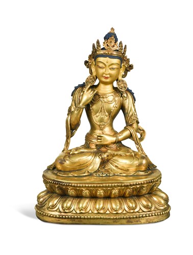 Lot 61 - A Sino-Tibetan style gilt bronze figure of Tara