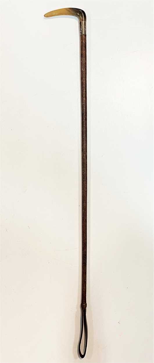 Lot 67 - A horn and silver gilt collared riding crop,