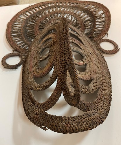 Lot 135 - A Papua New Guinea, Abelam, painted basketry old yam mask