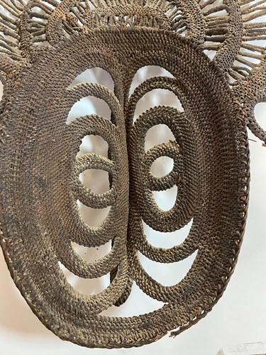 Lot 135 - A Papua New Guinea, Abelam, painted basketry old yam mask