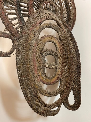 Lot 135 - A Papua New Guinea, Abelam, painted basketry old yam mask