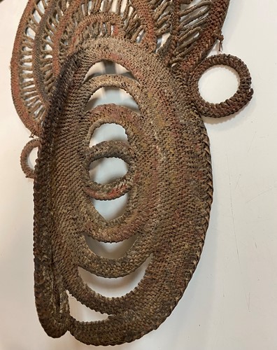 Lot 135 - A Papua New Guinea, Abelam, painted basketry old yam mask