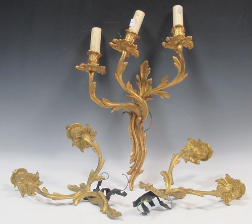 Lot 472 - An ormolu three-light wall light in rococo style