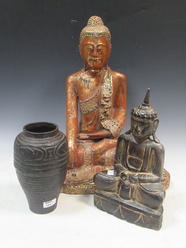 Lot 194A - An Oriental cast iron oviod vase, in archaic style