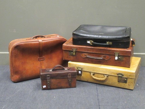 Lot 164 - Four leather suitcases, a pigskin case with a...