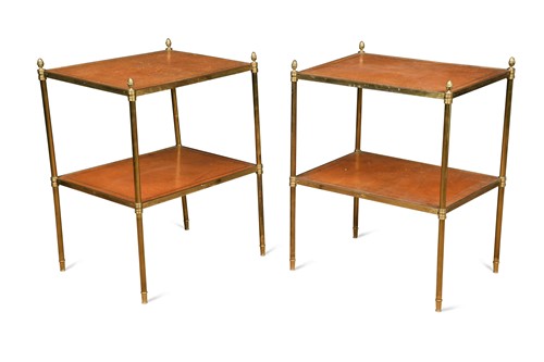 Lot 454 - A pair of brass and leather two-tier etageres, 20th century