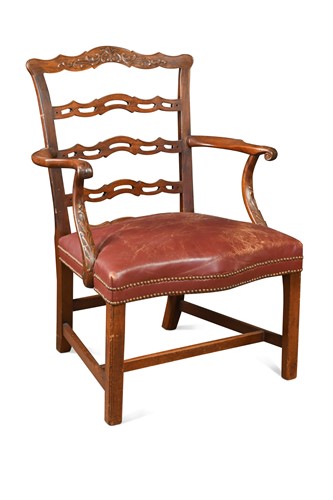Lot 357 - An early George III mahogany open armchair