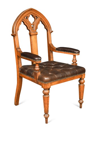 Lot 558 - A Puginesque Gothic oak armchair, late 19th century
